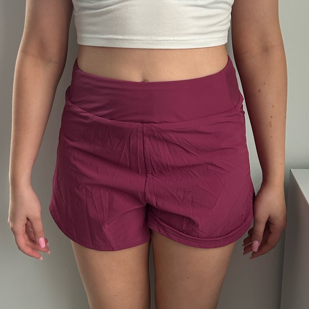 Nike pink running shorts
